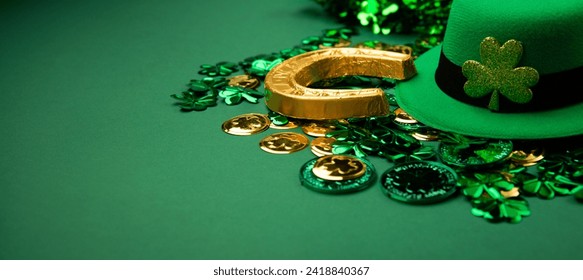 St. Patrick's Day leprechaun hat, gold coins and shamrocks on green background. Irish traditional holiday concept, copy space. - Powered by Shutterstock