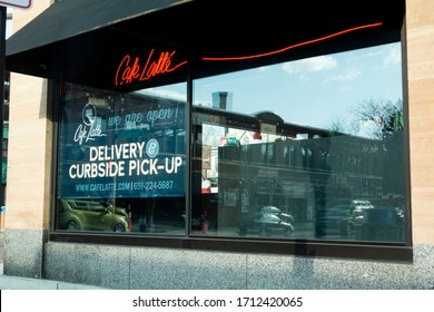 ST PAUL, MINNESOTA / USA - APRIL 17, 2020: Waiting In The Car For Curbside Delivery Of Our Food From Cafe Latte. 