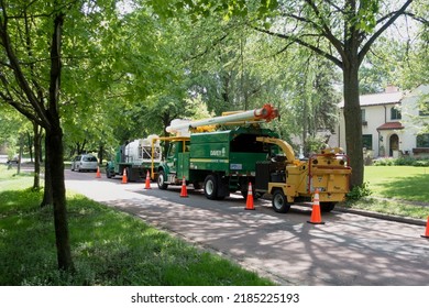 ST PAUL, MINNESOTA USA - MAY 25, 2021: Trucks And Machinery Parked And Ready For Street Maintenance.