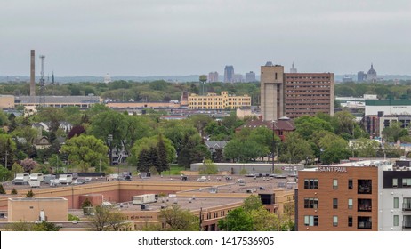 ST. PAUL, MN - MAY 2019 - A Shot Of The St. Paul Skyline Behind The Midway Neighborhood On A Cloudy Spring Day