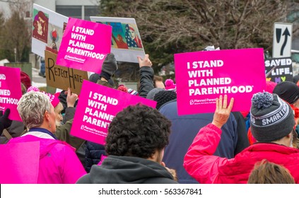 ST. PAUL, MN/USA - JANUARY 21, 2016: Unidentified particpants at the 2017 Women's March Minnesota. The Women's March represented the worldwide protest to protect women's rights and other causes.