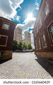 St. Paulus Cathedral With Domplatz - Cathedral Square In Summer With Sun And Sunbeam. Münster, North Rhine-Westphalia, Germany