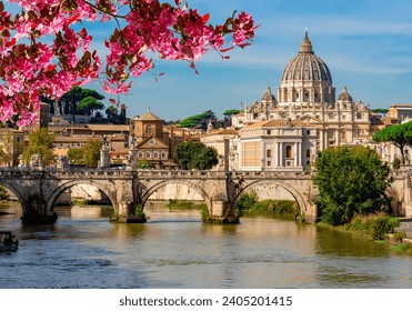 St Peter's basilica in Vatican and St. Angel bridge over Tiber river in spring, Rome, Italy