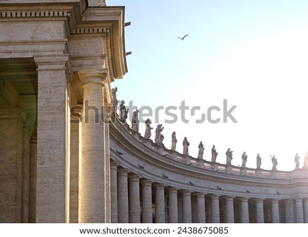 St. Peter's Square, Vatican, Rome, Italy View of the colonnade with statues of saints surrounding St. Peter's Square