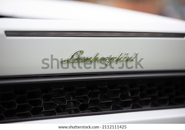 St. Petersburg,\
Florida, USA- JANUARY 23, 2022: The 17th Annual FESTIVALS OF SPEED\
ST. PETERSBURG, VINOY PARK. Lamborghini Aventador white color car\
details logo