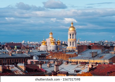 St. Petersburg, a panorama of the city roofs and the Cathedral with Golden domes. The historic center of the city is under restoration