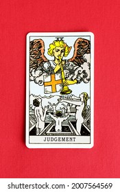 St. Petersburg, Russia, 12 July 2021: Illustrative editorial. Tarot card on a red background. Major Arcana XX Judgment.