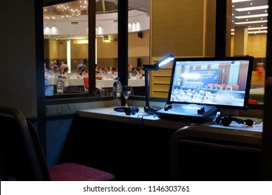 St. Petersburg, Russia - 25 JULY 2018 - Hotel Baltic - Remote Control, Monitor, And Headset Of The Interpreter In The Cabin Of Simultaneous Translation