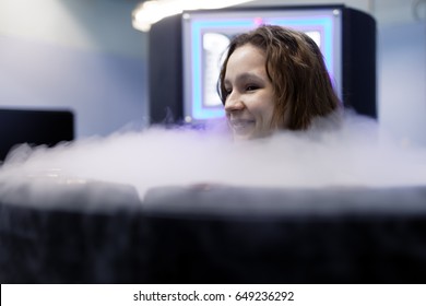 ST. PETERSBURG, RUSSIA - APRIL 13, 2017. Woman takes a cryotherapy treatment during he press tour to Krion enterprise. Founded in 1992, now Krion is exporting cryosaunas to dozens countries