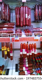 St. Petersburg, Russia - April 18, 2021: Smoked Sausage, Salami, Lunch Meat Products On Supermarket Shelves. Retail Industry And Chain. Grocery Store. Food Price. Product Of Meat Packing Industry.