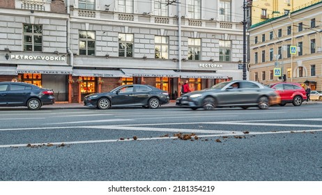 St. Petersburg, Russia - August 16, 2021: Excrement of a horse on the main street against a backdrop of cars and restaurants
