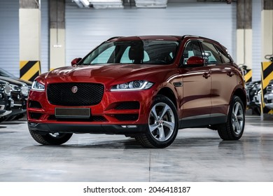 St Petersburg, Russia - August 28, 2021: Jaguar F-Pace I Front View, Three Quarters View, Headlight On