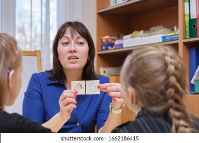 St. Petersburg, Russia - February 27, 2020: A Speech Therapist Specialist Conducts Speech Correction Classes In A Children's Preschool Specialized Institution. The Correct Pronunciation Of Sounds