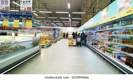 St. Petersburg, Russia - January 1, 2021: Top Russian Supermarket is one of largest players of retail industry. Shelves with fresh food, dairy products. Rack. Grocery shopping. Deflation concept.