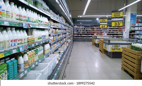 St. Petersburg, Russia - January 12, 2021: Top Russian Supermarket Is One Of Largest Players Of Retail Industry In Russia. Shelves With Milk, Fresh Dairy Food. Aisle.  Grocery Shopping. Discount.