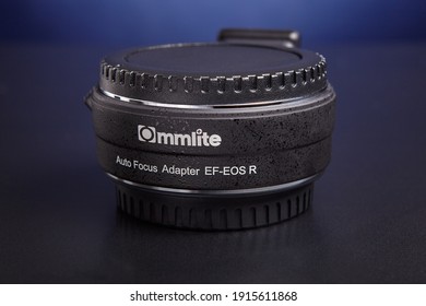 St. Petersburg, Russia - January 9, 2021: Commlite Lens Adapter For Canon EF To EOS R Mount.