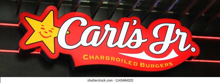 ST. PETERSBURG, RUSSIA - JULY 25, 2018: Carl's Jr. Fast Food Restaurant Logo. Close Up View Of Carl's Jr. Burger Joint Brand Logo. Carl's Jr. Is World Famous American Fastfood Restaurant Chain.