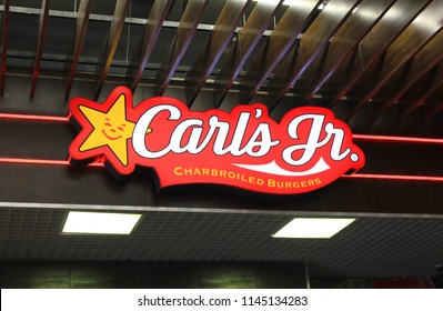 ST. PETERSBURG, RUSSIA - JULY 25, 2018: Carl's Jr. Fast Food Restaurant Logo. Close Up View Of Carl's Jr. Burger Joint Colorfu Brand Logo. Carl's Jr. Is World Famous American Fastfood Restaurant Chain