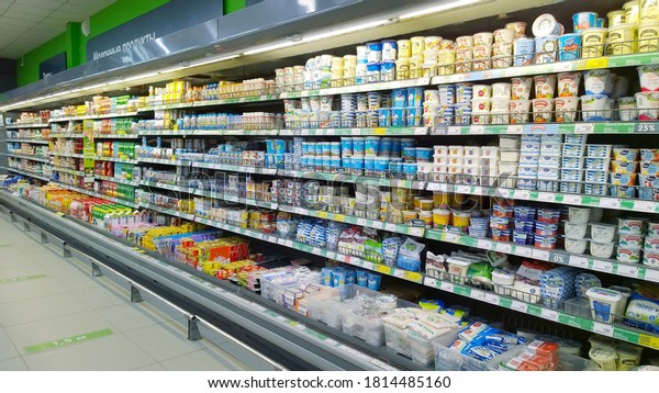 St.\
Petersburg, Russia - July 8, 2020: Top Russian Supermarket is one\
of largest players of retail industry in Russia. Shelves with dairy\
products, healthy yogurt. Rack with fresh\
food.