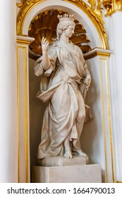 St. Petersburg, Russia - June 26, 2019: Marble statue "Power" on the Jordan staircase in the Winter palace (State Hermitage Museum) in St. Petersburg, Russia
