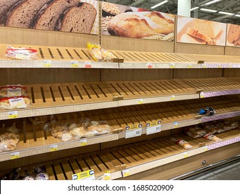 St. Petersburg / Russia - March 2020: Empty Bread Shelves At Supermarket - People Stocking Food For Staying Home