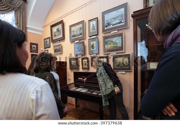ST. PETERSBURG, RUSSIA - MARCH\
24, 2016: Chief curator of the Literary Museum Ksenia Chudakova\
holds the presentation for tour operators and media\
representatives