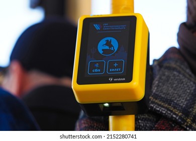 St. Petersburg, Russia - May, 2022:  Transport reform. Prepaid validation machine,cashless ticketing system inside city transport. Public transport service. Modern transportation control technology