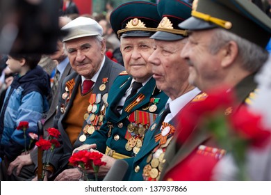 ST. PETERSBURG, RUSSIA - MAY 9: Old veterans of  WWII  decorated with orders and medals during festivities devoted to anniversary of Victory Day on May 9, 2013 in Saint- Petersburg
