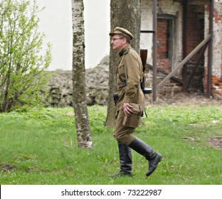 ST. PETERSBURG, RUSSIA - MAY 9: Unidentified man reproduce the battle between the Soviet and Allied Armies against Fascist Forces on May 9, 2010 in Shlisselburg Fortress, St. Petersburg, Russia.