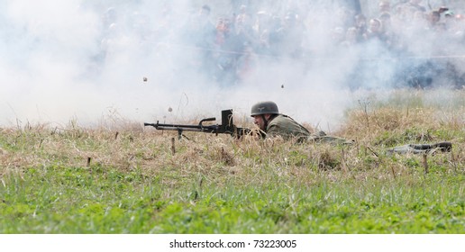 ST. PETERSBURG, RUSSIA - MAY 9: Unidentified man reproduce the battle between the Soviet and Allied Armies against Fascist Forces on May 9, 2010 in Shlisselburg Fortress, St. Petersburg, Russia.