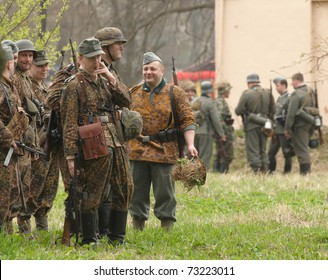 ST. PETERSBURG, RUSSIA - MAY 9: Unidentified men reproduce the battle between the Soviet and Allied Armies against Fascist Forces on May 9, 2010 in Shlisselburg Fortress, St. Petersburg, Russia.