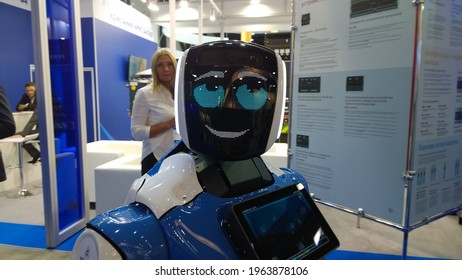 St. Petersburg, Russia - October, 2019: Service humanoid robot for business in exhibition. Artificial Intelligence AI and Robotics. Fourth Industrial Revolution. ML. 4IR. Emerging technologies.