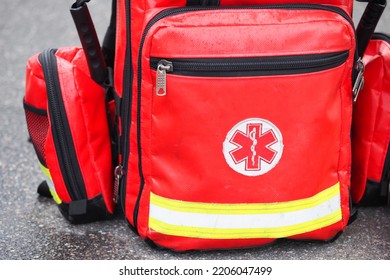 St Petersburg. Russia - September, 2022: Rescue Backpack With Ambulance First Aid Kit, Medical Star Of Life Logo, Symbol Of Emergency Medical Services, Star Includes The Rod Of Asclepius