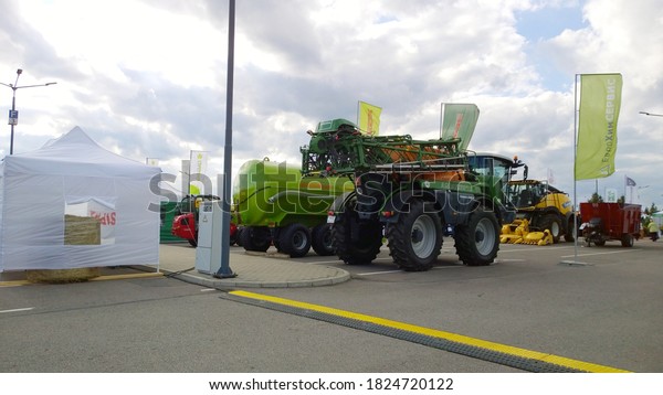 St. Petersburg, Russia - September 4, 2020:\
Agricultural machinery exhibition. Venue for farmers business.\
Manufacturing and supply equipment for crop production, harvesting,\
road construction. Expo.
