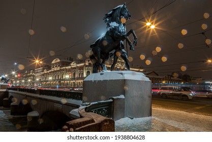 St. Petersburg. Snowfall. Equestrian Sculpture On Anichkov Bridge Over Fontanka River. Made In The 19th Century. Inscription On Bridge: Passage Of Ships Prohibited. Open Space. Common Property