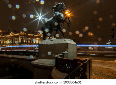 St. Petersburg. Snowfall. Equestrian Sculpture On Anichkov Bridge Over Fontanka River. Made In The 19th Century. Inscription On Bridge: Passage Of Ships Prohibited. Open Space. Common Property