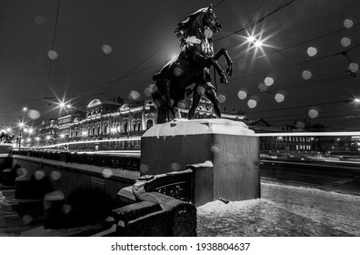 St. Petersburg. Snowfall. Equestrian Sculpture On Anichkov Bridge Over Fontanka River. Made In The 19th Century. Inscription On Bridge: Passage Of Ships Prohibited. Open Space. Common Property