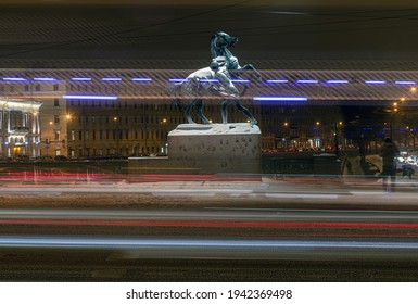 St. Petersburg. Snowfall. Equestrian Sculpture On Anichkov Bridge Over Fontanka River. Made In The Middle Of The 19th Century. Open Space. Common Property