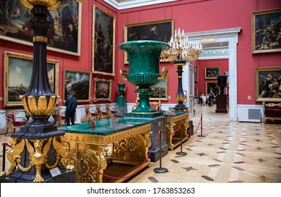 ST. PETERSBURG/RUSSIA - SEPT. 7, 2019: Photo of a beautiful large krater malachite vase in the Italian Skylight Room in the New Hermitage.