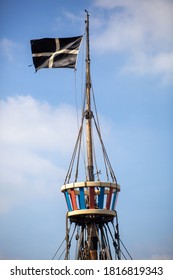 St Piran's flag flying from the crows nest of a ship
