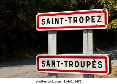 St. Tropez Road Sign And Trees On Background