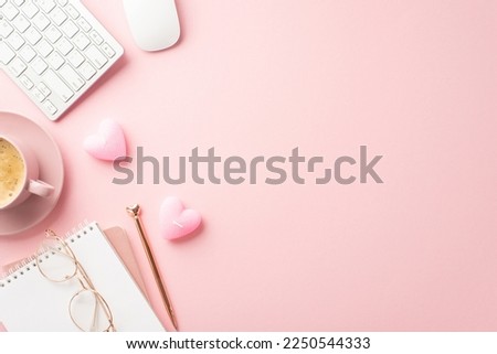 St Valentine's Day concept. Top view photo of notepad pen keyboard computer mouse glasses heart shaped candles and cup of coffee on saucer on isolated pastel pink background with copyspace