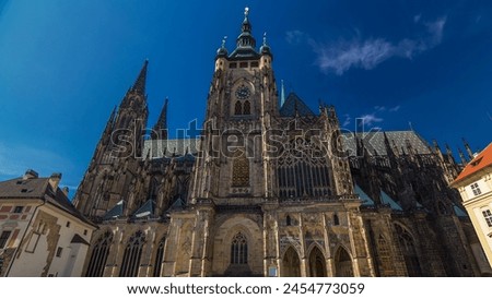 St. Vitus Cathedral timelapse hyperlapse in Prague surrounded by tourists. Located within Prague Castle and containing the tombs of many Bohemian kings and Holy Roman Emperors.