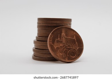 Stack of 10 Czech crowns coins isolated on a white background. Ten or 10 Czech crown coin