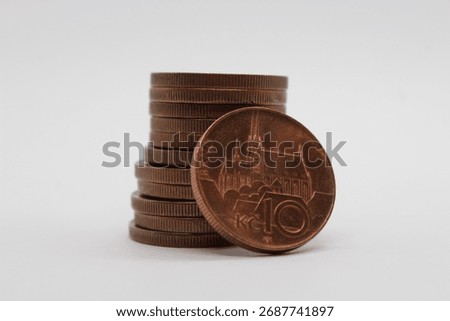 Stack of 10 Czech crowns coins isolated on a white background. Ten or 10 Czech crown coin