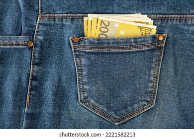 A Stack Of 200 Euro Bills In A Jeans Pocket. Money In The Back Pocket Of My Jeans. The Concept Of Investment, Cash, Wealth And Profit. Copyspace.