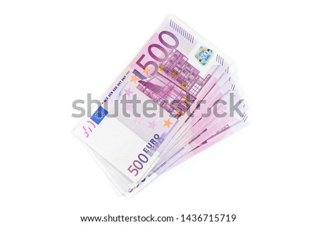 Stack of 500 Euro banknotes. European currency money banknotes isolated on white backdrop. Top view closeup. Salary, savings, european union economic crisis concept.