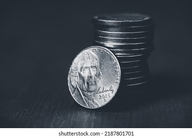 Stack Of American Coins On The Table. Money And Finance Concept