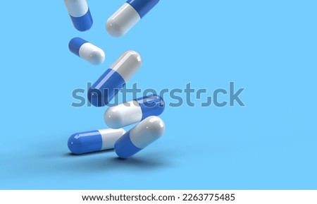 A stack of antibiotic pill Blue capsules falling Healthcare and medical 3D background