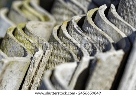Stack of asbestos roofing sheets. Carcinogenic eternite.